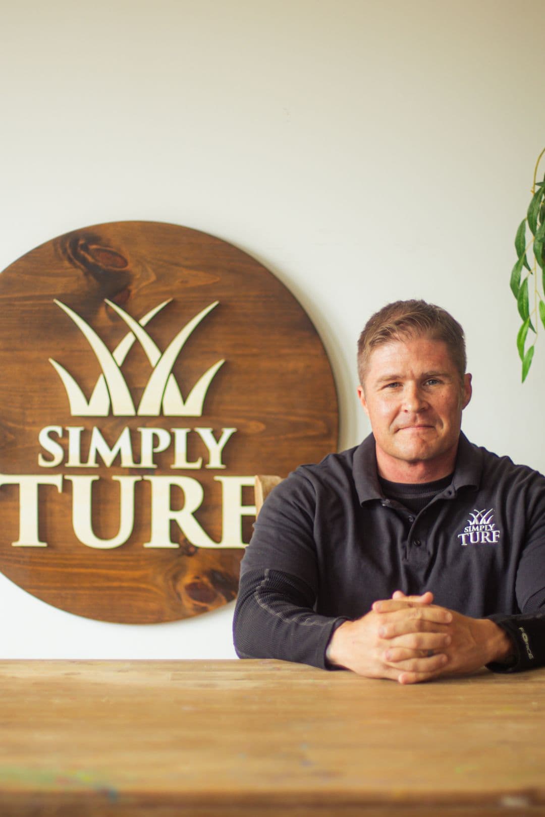 The Simply Turf crew with a service truck