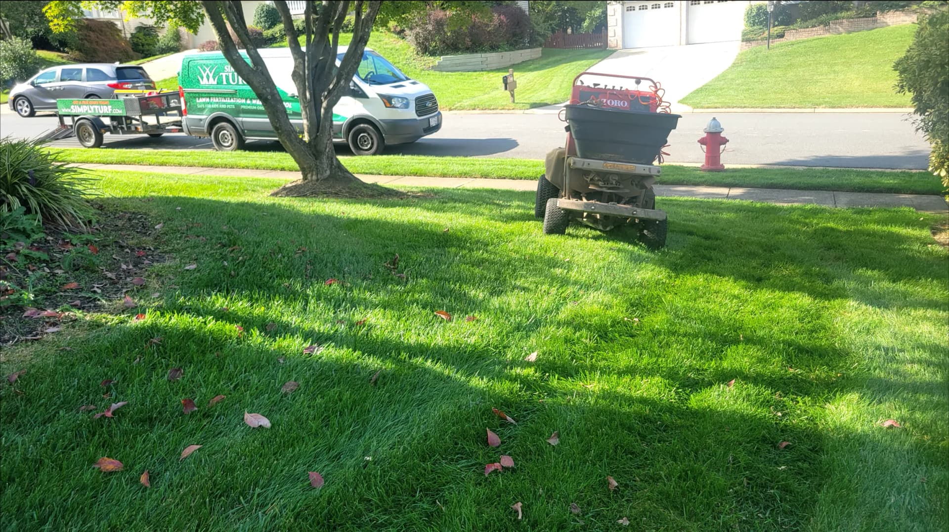 Our topdresser applies an even layer of premium organic compost across the lawn